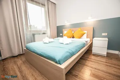 Łóżko lub łóżka w pokoju w obiekcie BatogoSpot Tumski 2