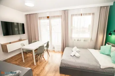 Łóżko lub łóżka w pokoju w obiekcie BatogoSpot Tumski 2