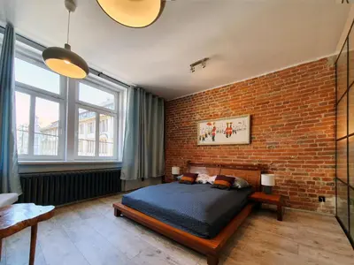 Łóżko lub łóżka w pokoju w obiekcie Ruska61 Apart