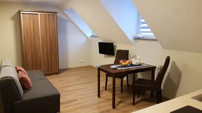 Telewizja i/lub zestaw kina domowego w obiekcie U Podnóża Zamku