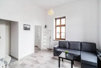 Część wypoczynkowa w obiekcie Apartament z osobną sypialnią w pięknej kamienicy w centrum