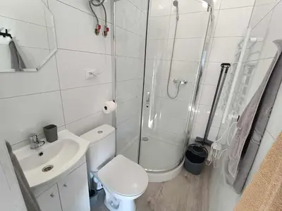 Łazienka w obiekcie Kudowskie Chatynki Domki Całoroczne MINI ZOO