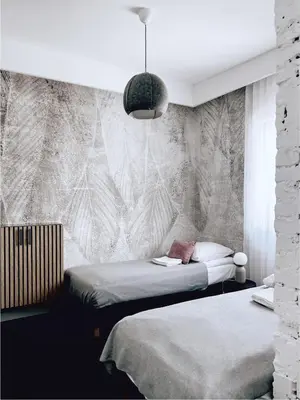 Łóżko lub łóżka w pokoju w obiekcie Wygodne Pokoje H114
