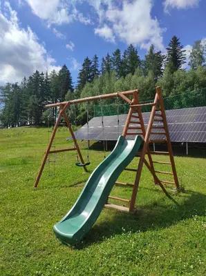 Plac zabaw dla dzieci w obiekcie Domy wakacyjne Familia