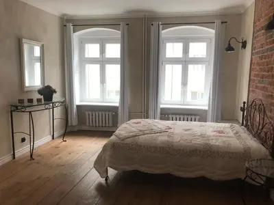 Łóżko lub łóżka w pokoju w obiekcie Apartament Rustical