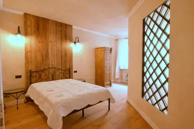 Łóżko lub łóżka w pokoju w obiekcie Apartament Rustical