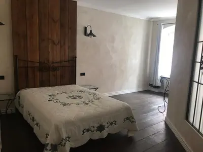 Łóżko lub łóżka w pokoju w obiekcie Apartament Rustical