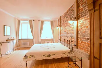 Łóżko lub łóżka w pokoju w obiekcie Apartament Rustical