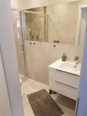 Łazienka w obiekcie Apartament Okrzei