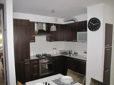 Kuchnia lub aneks kuchenny w obiekcie Apartament Okrzei