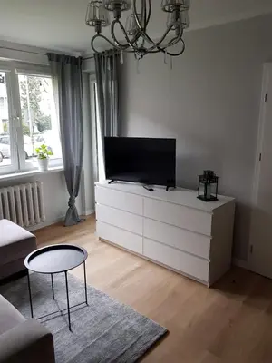 Telewizja i/lub zestaw kina domowego w obiekcie Apartament Okrzei