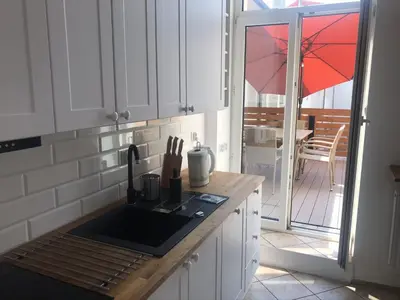 Kuchnia lub aneks kuchenny w obiekcie Nokturn Apartament