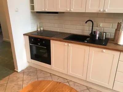 Kuchnia lub aneks kuchenny w obiekcie Nokturn Apartament