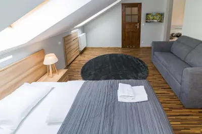 Łóżko lub łóżka w pokoju w obiekcie Apartamenty Asia Basia