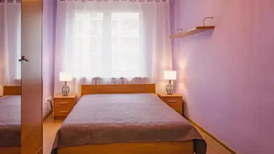 Łóżko lub łóżka w pokoju w obiekcie Mieszkanie przy Rynku