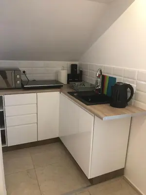Kuchnia lub aneks kuchenny w obiekcie Apartament przy Parku Zdrojowym