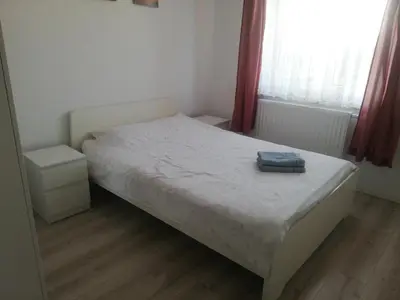 Łóżko lub łóżka w pokoju w obiekcie Apartament Maja
