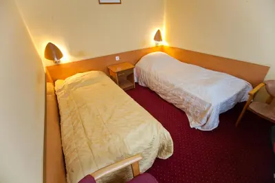 Łóżko lub łóżka w pokoju w obiekcie Hostel Malinowski City