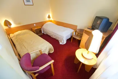 Łóżko lub łóżka w pokoju w obiekcie Hostel Malinowski City
