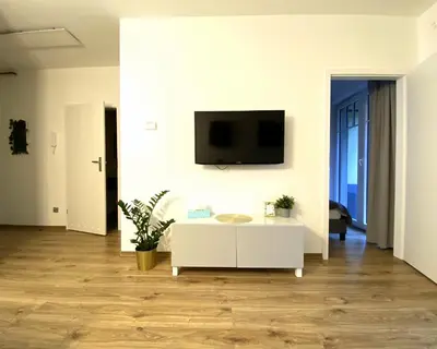 Telewizja i/lub zestaw kina domowego w obiekcie Apartamenty Polanica Zdrój