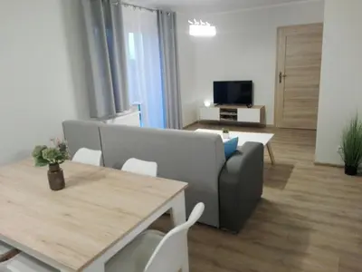 Telewizja i/lub zestaw kina domowego w obiekcie Apartamet Marzenie 7 - Opole