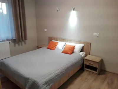 Łóżko lub łóżka w pokoju w obiekcie Apartamet Marzenie 7 - Opole