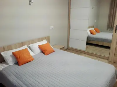 Łóżko lub łóżka w pokoju w obiekcie Apartamet Marzenie 7 - Opole