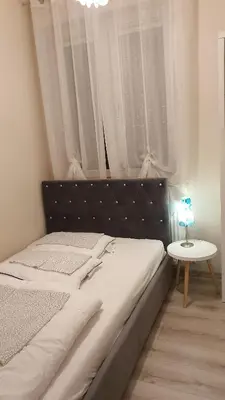 Łóżko lub łóżka w pokoju w obiekcie Willa Nad Potokiem