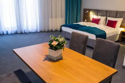 Łóżko lub łóżka w pokoju w obiekcie Stary Młyn