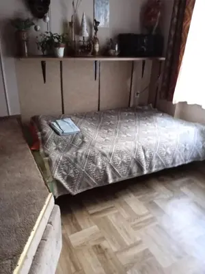 Łóżko lub łóżka w pokoju w obiekcie Pawi Ogon