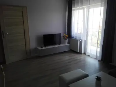 Telewizja i/lub zestaw kina domowego w obiekcie Apartament Marzenie 9 - Opole