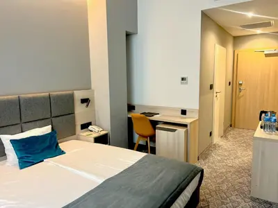 Łóżko lub łóżka w pokoju w obiekcie Korona Gold - Korona Hotel Wrocław