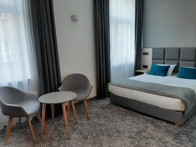 Łóżko lub łóżka w pokoju w obiekcie Korona Gold - Korona Hotel Wrocław