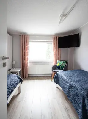 Łóżko lub łóżka w pokoju w obiekcie Agrodomek - komfortowy Apartament na Górnym Śląsku