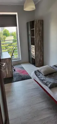 Łóżko lub łóżka w pokoju w obiekcie Apartament Przejazdowa