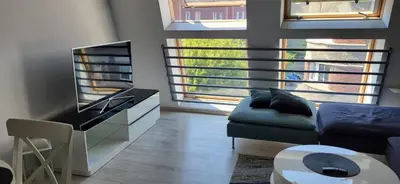Telewizja i/lub zestaw kina domowego w obiekcie Apartament Przejazdowa