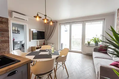 Kuchnia lub aneks kuchenny w obiekcie B&W Luxurious Apartment in the center of Wroclaw