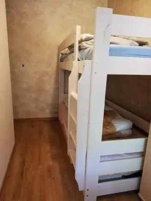 Łóżko lub łóżka w pokoju w obiekcie OLEK
