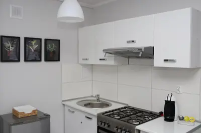 Kuchnia lub aneks kuchenny w obiekcie APARTAMENT SŁOBÓDZKIEGO 7