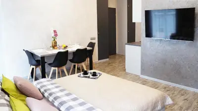 Telewizja i/lub zestaw kina domowego w obiekcie Art Apartments II