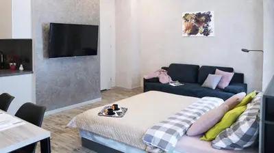Telewizja i/lub zestaw kina domowego w obiekcie Art Apartments II