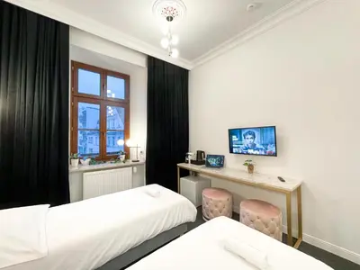 Łóżko lub łóżka w pokoju w obiekcie Apartamenty Stary Browar Oleśnica