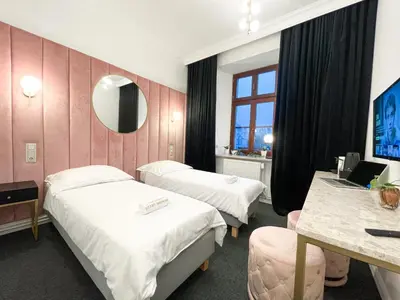 Łóżko lub łóżka w pokoju w obiekcie Apartamenty Stary Browar Oleśnica