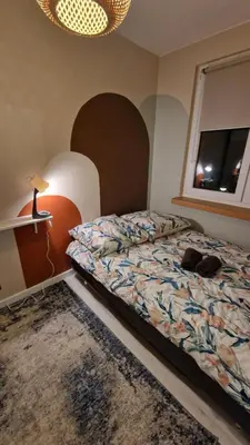 Łóżko lub łóżka w pokoju w obiekcie Apartament Poselska