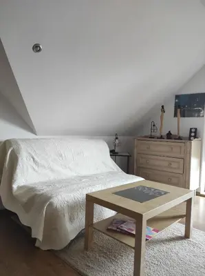 Łóżko lub łóżka w pokoju w obiekcie Przyjazny Domek