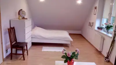 Łóżko lub łóżka w pokoju w obiekcie Przyjazny Domek