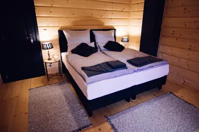 Łóżko lub łóżka w pokoju w obiekcie Belle Maison