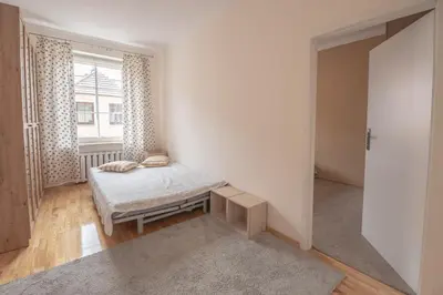 Łóżko lub łóżka w pokoju w obiekcie Apartament Rynek 11B - Self Check In