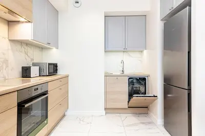Kuchnia lub aneks kuchenny w obiekcie Apartment Walońska with FREE PARKING Wrocław by Noclegi Renters
