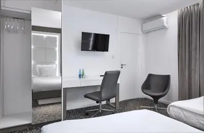 Łóżko lub łóżka w pokoju w obiekcie Hotel Maria